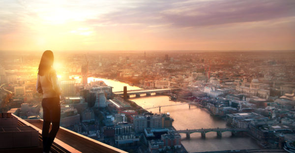 A confident woman looks out over London