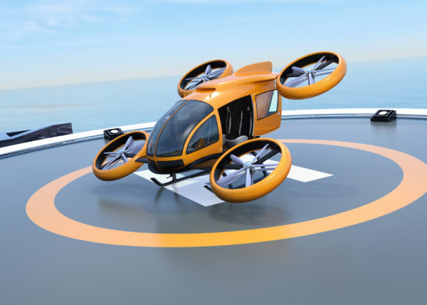 Orange self-driving electric drone plane