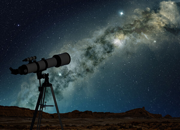A telescope observing the Milky Way.
